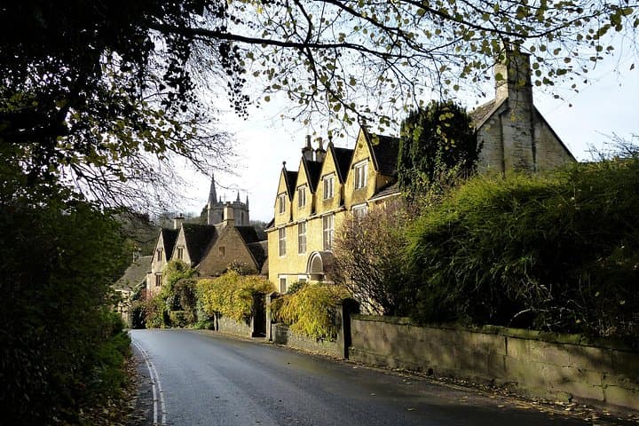 Golden Cotswold stone houses.